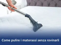 Un professionista effettua la pulizia dei materassi con un aspiratore, garantendo un ambiente sano e igienico.